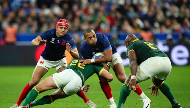 Gael Fickou of France is tackled by Handre Pollard of South Africa during the Rugby World Cup quarter final match on October 15, 2023